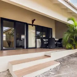 Private terrace with outdoor seating at vacation rental in Curaçao – BookCuracao.com